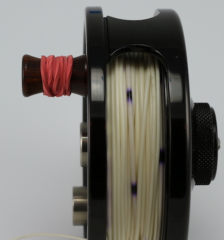 Fly Reel Handle modified with a rubber band
for better grip